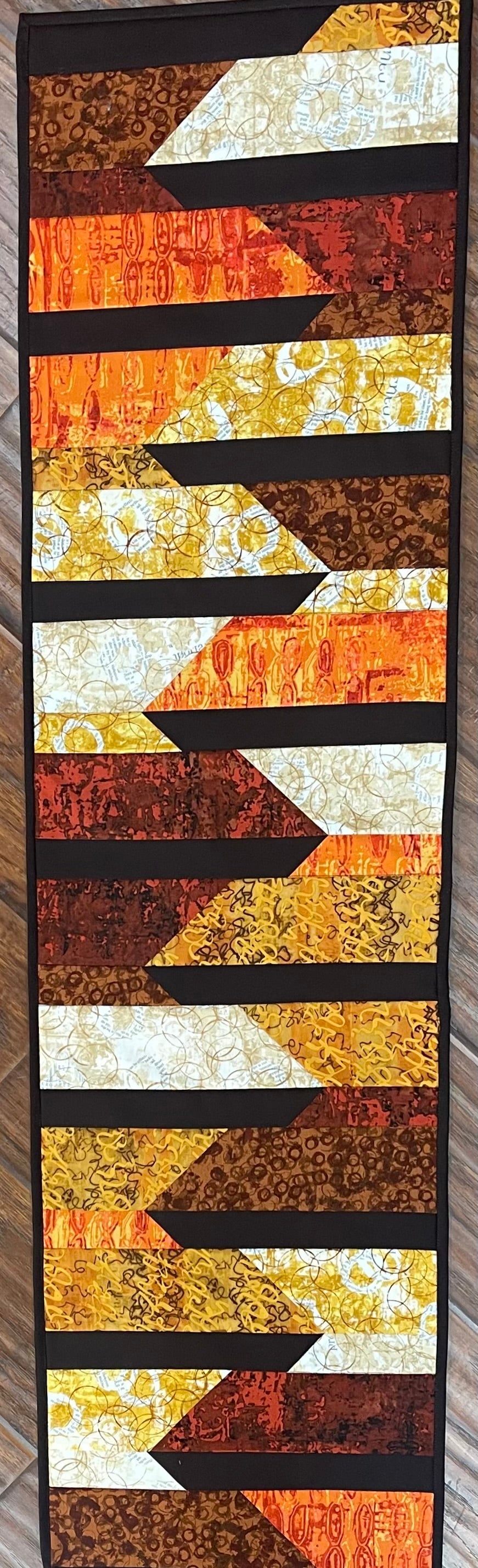 Kit:  Monorail Table Runner Storyboard Warm (pattern not included)