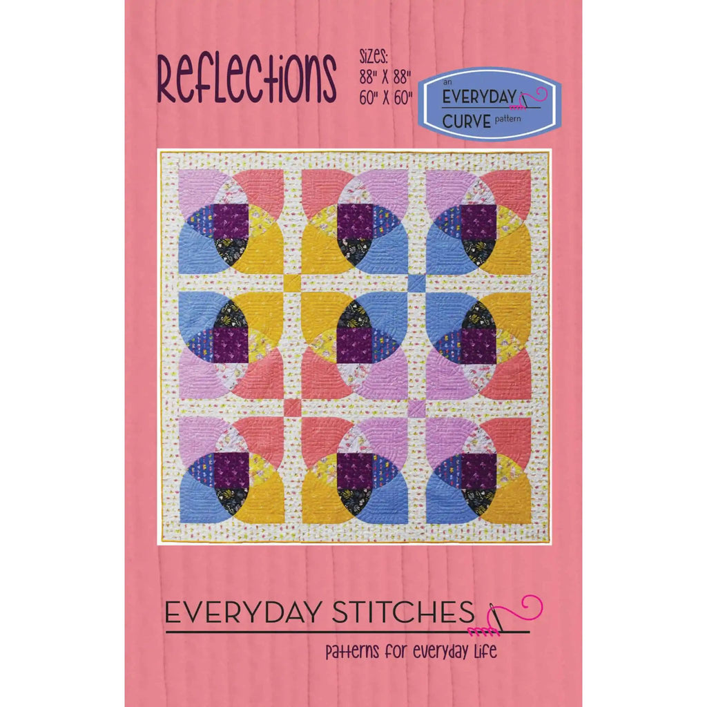 Quilt pattern book cover with colorful quilt design on a pink background