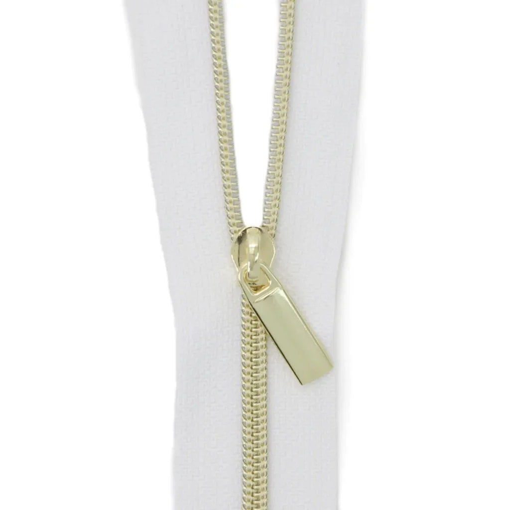 White Nylon Coil Zipper #3 - Gold Finish